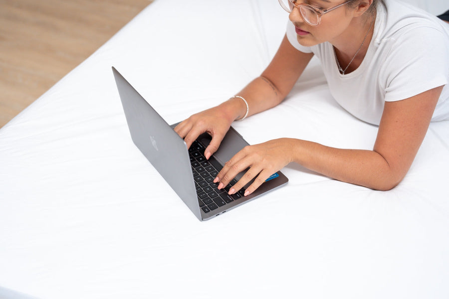 Researching queen and king mattress sizes on bed