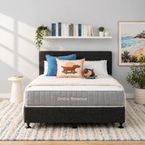 Bed with Ortho Balance mattress in a bedroom setting