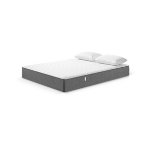 Mattress and pillow on a white background