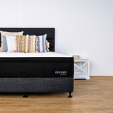 Odyssey mattress with bed base and headboard and pillows