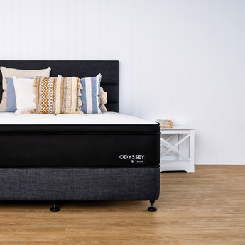 Odyssey mattress with bed base and headboard and pillows