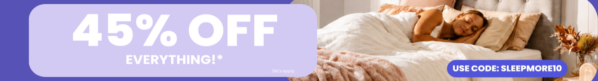 Promotional banner with '45% off everything' offer and a couple in bed with a dog.