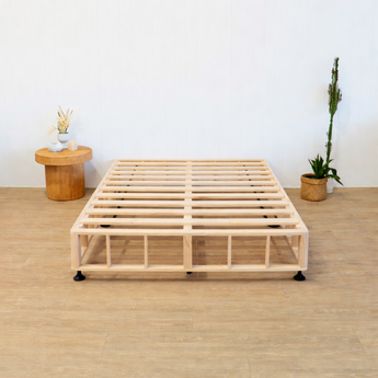 Scandi Naptime bed frame on a wooden floor with minimal decor
