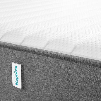 Close up of Naptime dual mattress with Naptime logo