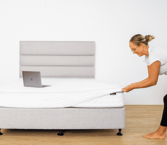 Fitting a waterproof mattress protector over a mattress