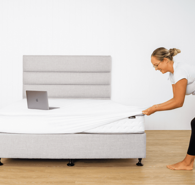 Fitting a waterproof mattress protector over a mattress