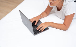 Researching queen and king mattress sizes on bed