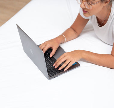 Researching queen and king mattress sizes on bed