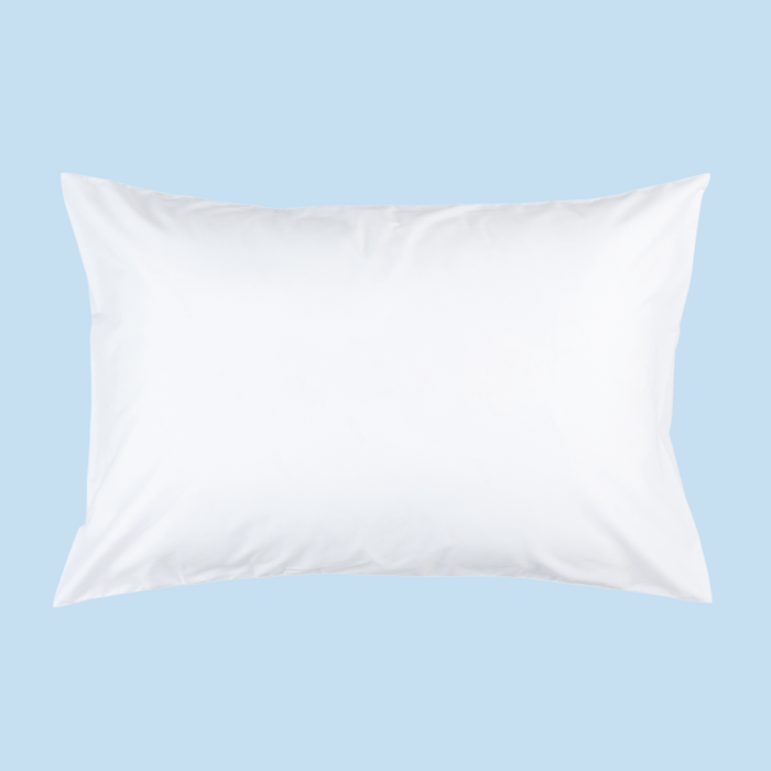 A white rectangular pillow against a blue background.