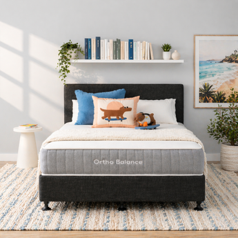 Bed with Ortho Balance mattress in a bedroom setting