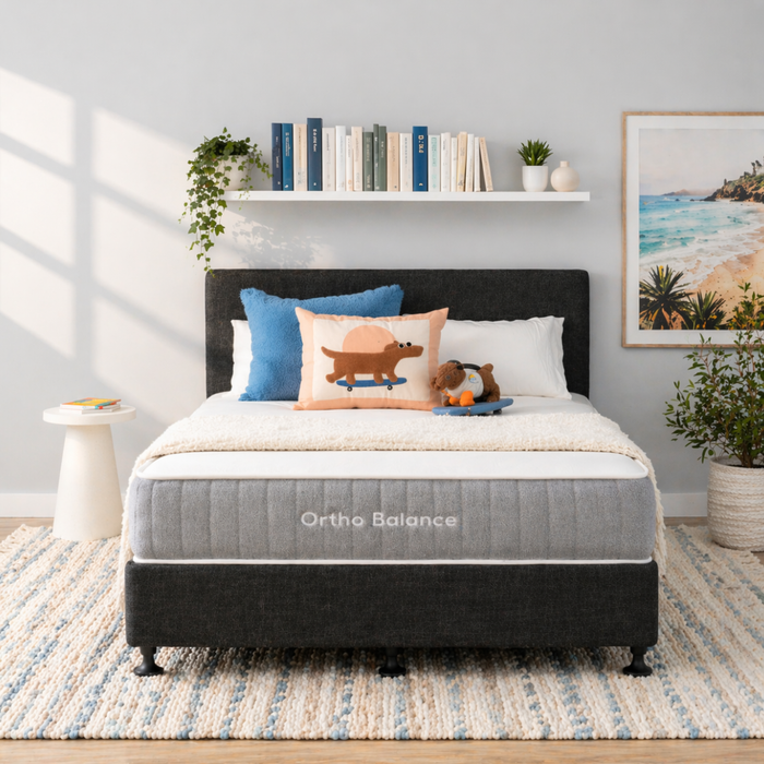 Bed with Ortho Balance mattress in a bedroom setting