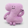 Purple plush toy with a smiling face on a white background