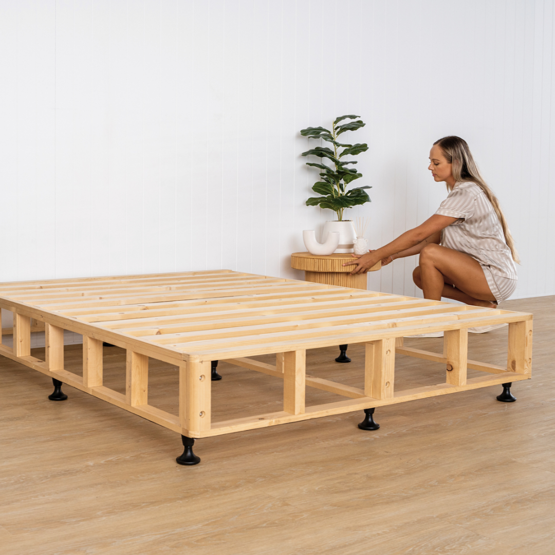 Scandi bed base with girl and pot plant 