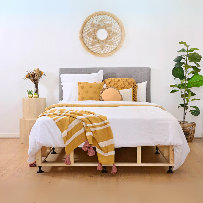 Scandi timber bed base and headboard with pillows and throws 