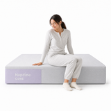 Person sitting on the edge of the Naptime Core mattress