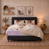 Couple lying on the Naptime Core mattress