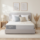 Naptime Mellow bed frame in grey with attached headboard, made up with a Naptime Ease mattress