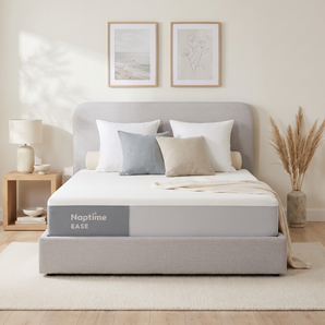 Naptime Mellow bed frame in grey with attached headboard, made up with a Naptime Ease mattress